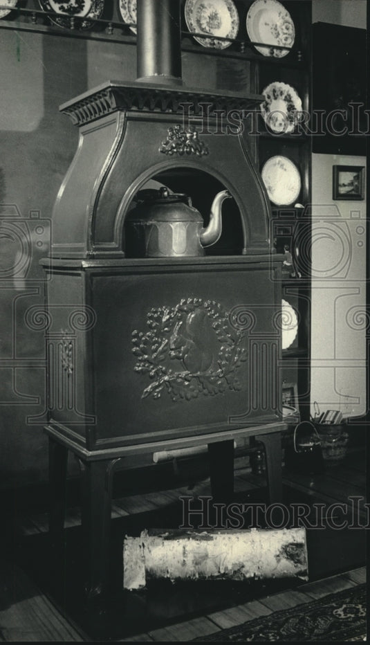 1987, gray, Danish porcelain stove mainly decorative, but can heat - Historic Images