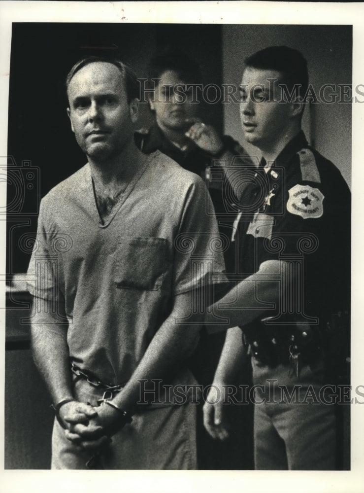 1993, Rick Spaude led into court by Waukesha County deputies - Historic Images