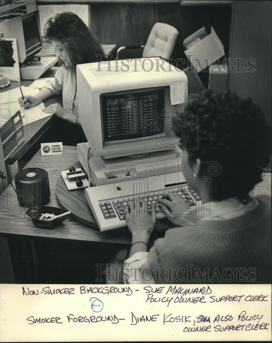 1986, Air Purifier Separates Diane Kosik From Non-Smoker Sue Maynard - Historic Images