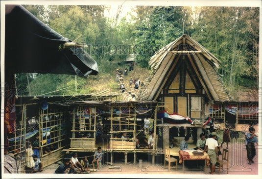 1992, Funeral procession gets under way in Indonesia as family waits - Historic Images