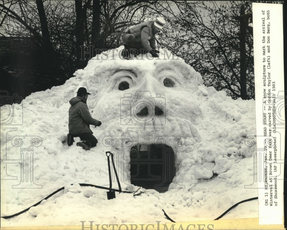1983, Gordon Taylor (left) and Don Berg create snow sculpture. - Historic Images