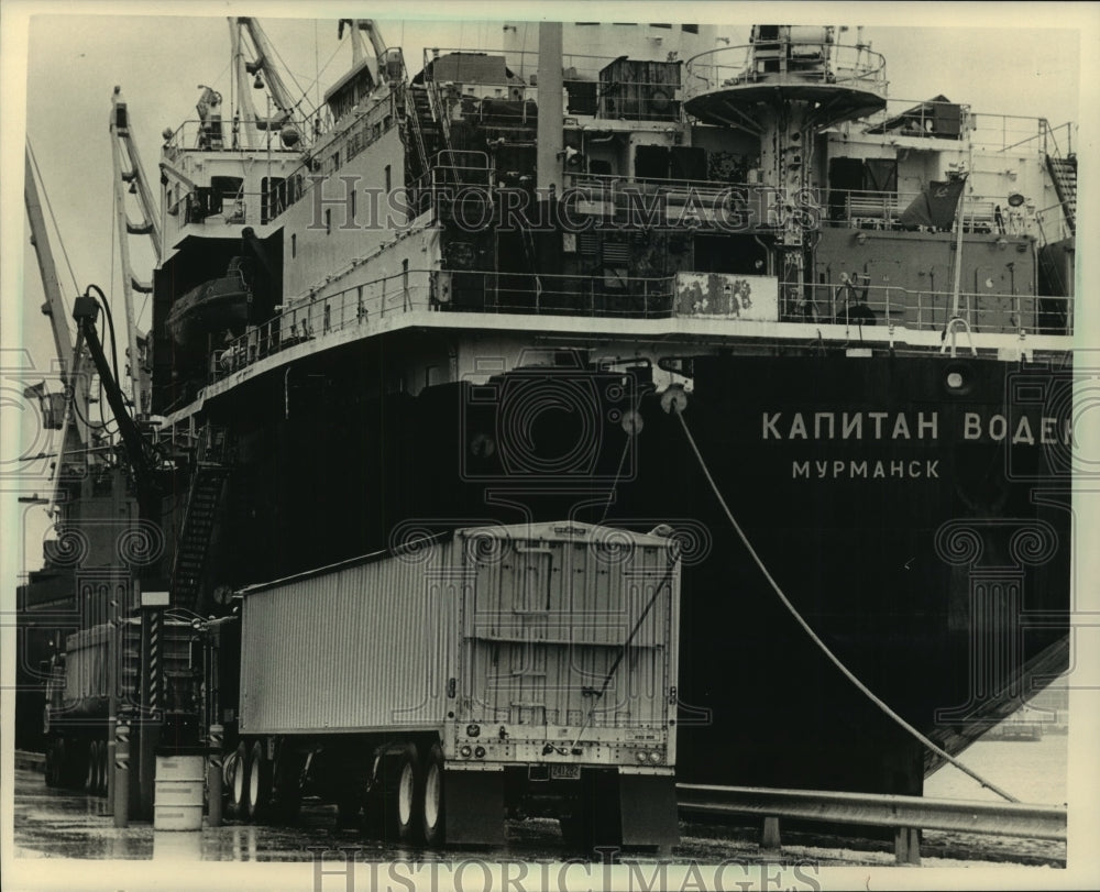 1987, Trucks Wait Near Soviet Kapitan Vodenko at Port of Milwaukee - Historic Images