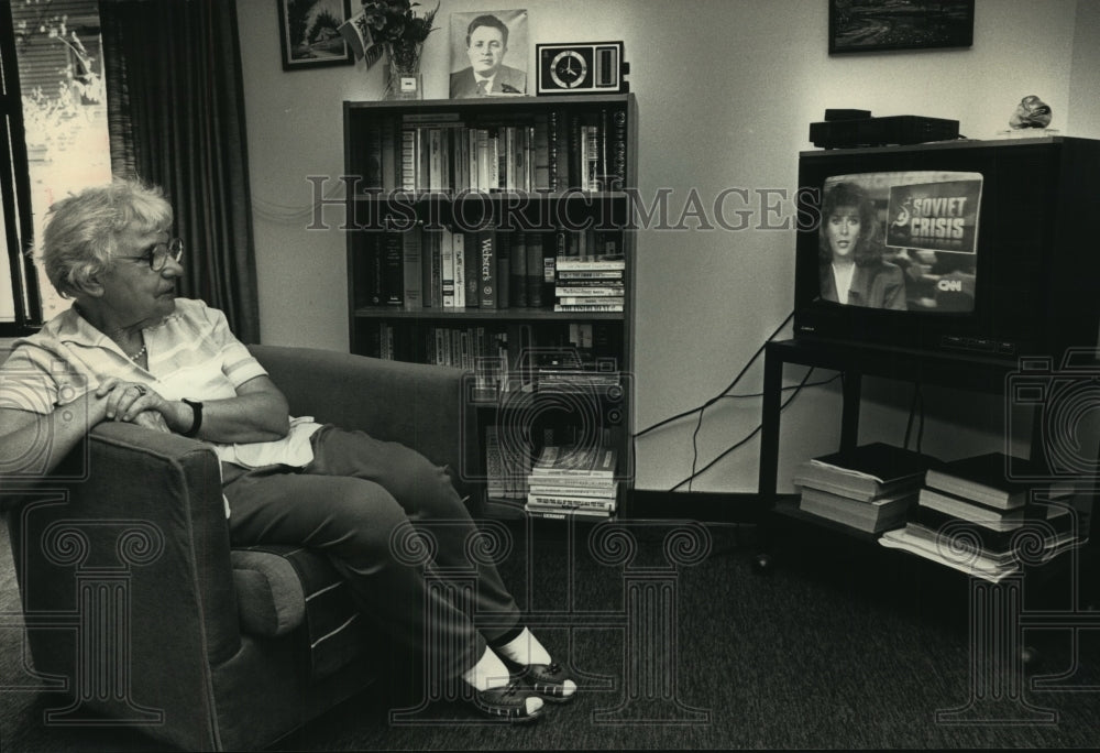 1991, Russian Sulamif Komissarchik Watching Television in Milwaukee - Historic Images