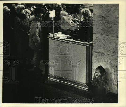 1992 Girl waits for mother who shops in Detsky Mir in Moscow - Historic Images