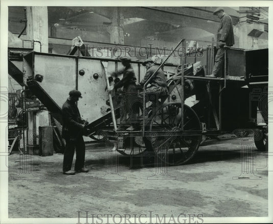 1968 Press Photo People Working on Soviet Farm Machinery Plant in Early 1930's-Historic Images
