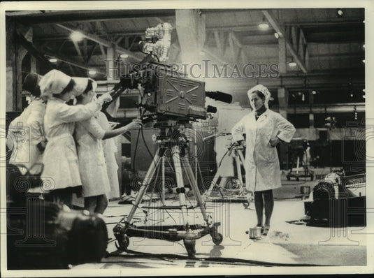 1974, A Russian television crew reports at a steel wire mill - Historic Images