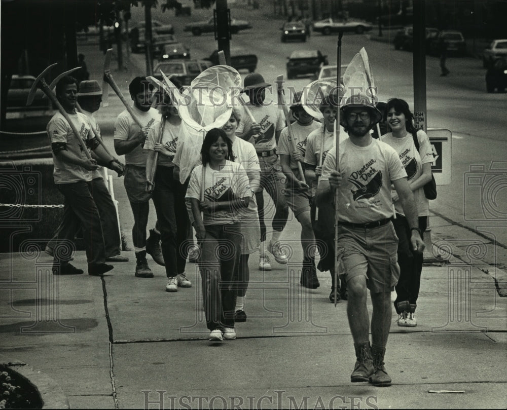 1989, The Milwaukee Pickax and Butterfly Net Drill Team in parade - Historic Images