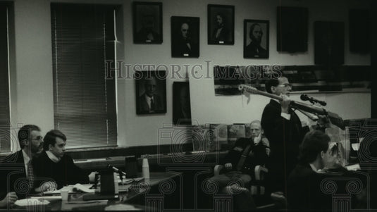 1995, Accused and attorney in court, DA holds "Thor" rifle, Waukesha. - Historic Images