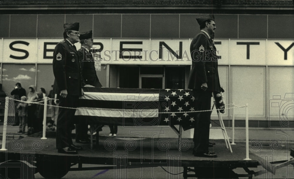 1987, Amvets Post 60 presenting casket honoring veterans, Milwaukee. - Historic Images
