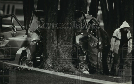 1994, Bank robber James Oswald, stolen vehicle wrecked - mjc01878 - Historic Images