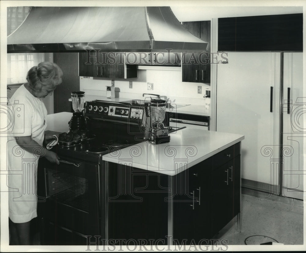 1965, Viola Sander in test kitchen at Oster Manufacturing, Wisconsin - Historic Images