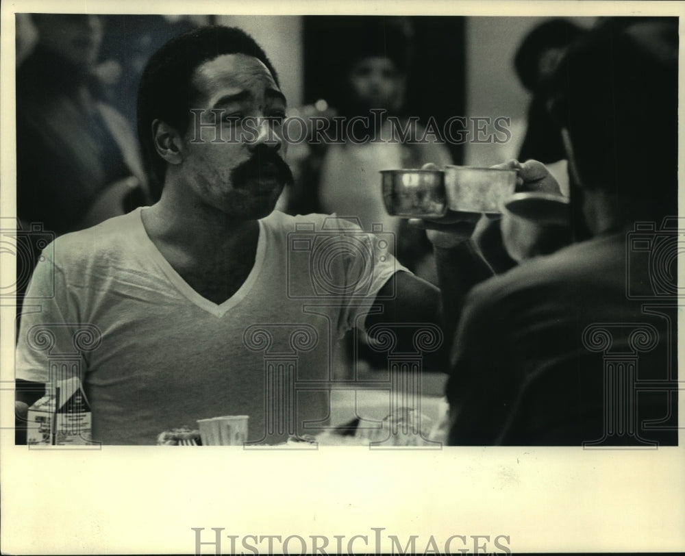 1984, Two inmates, House of Correction, toast at Christmas meal - Historic Images
