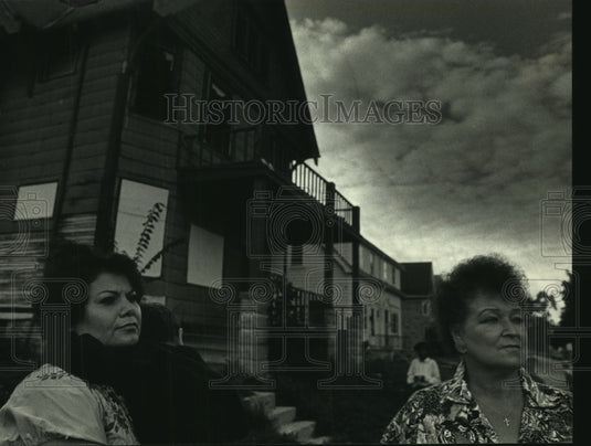 1991, Longtime Metcalfe Park Residents in Front of Vandalized House - Historic Images
