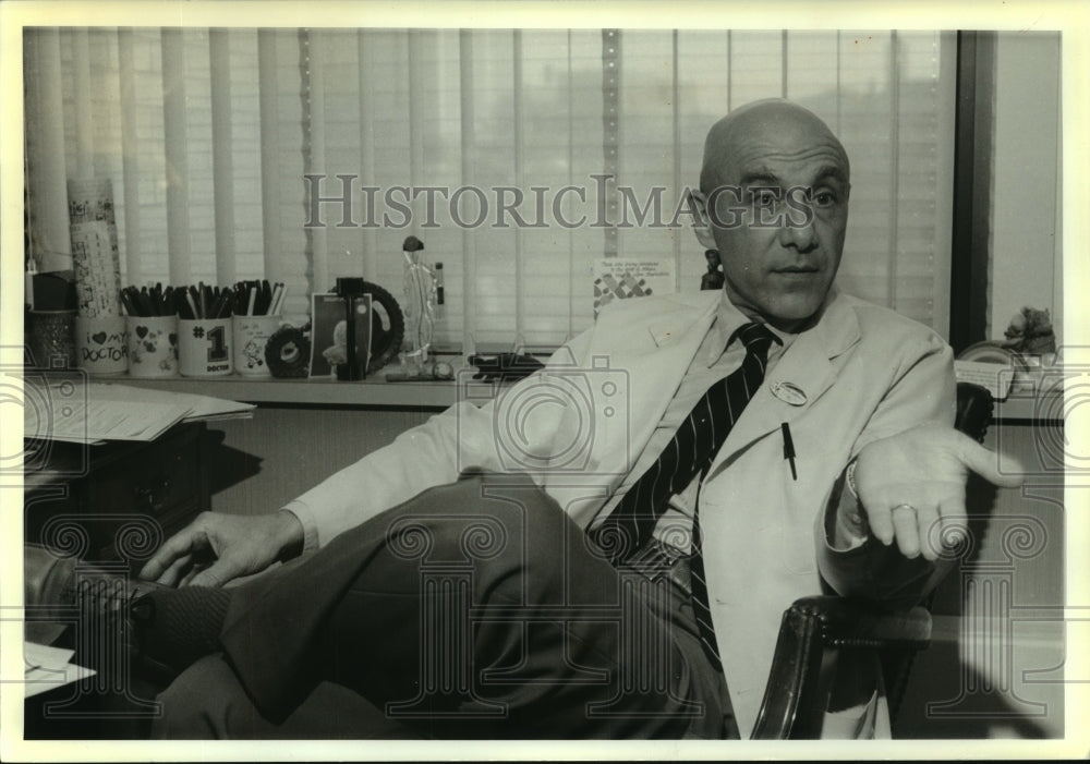 1988, Dr. Bernie Siegel in his New Haven Connecticut office - Historic Images