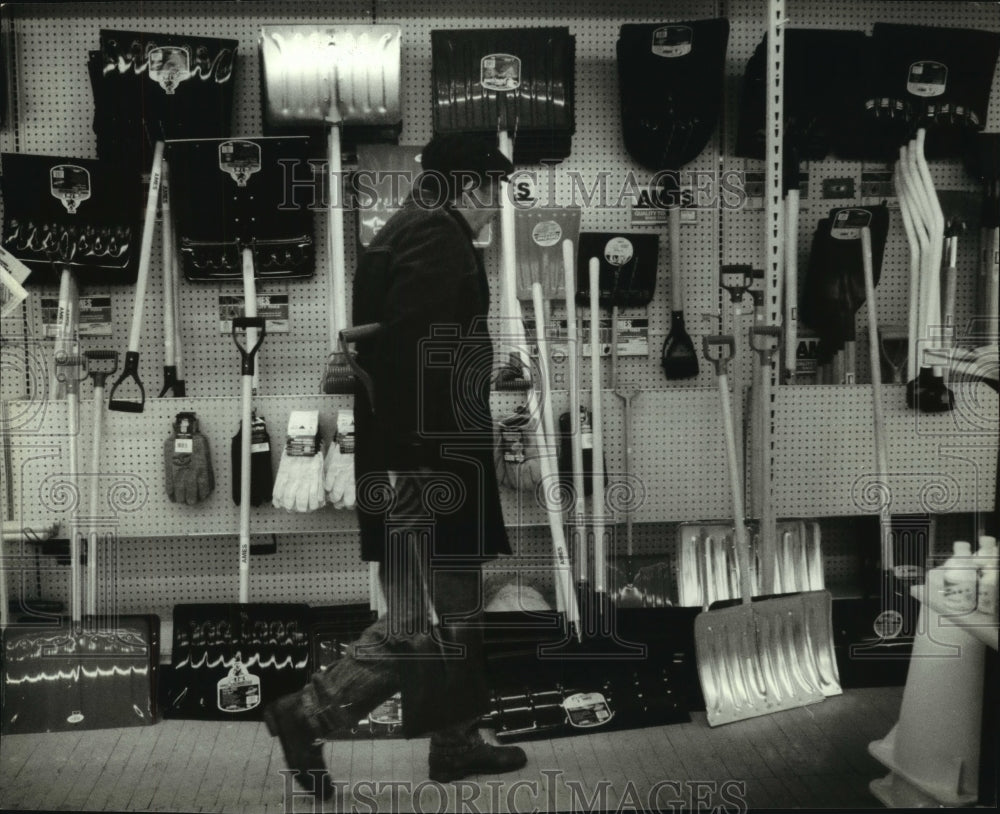 1994 Ace Hardware, Milwaukee selling shovels for first major storm. - Historic Images