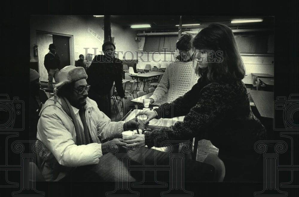 1988, Colleen Scanlan serves guests at St. Gall&#39;s Catholic Church - Historic Images