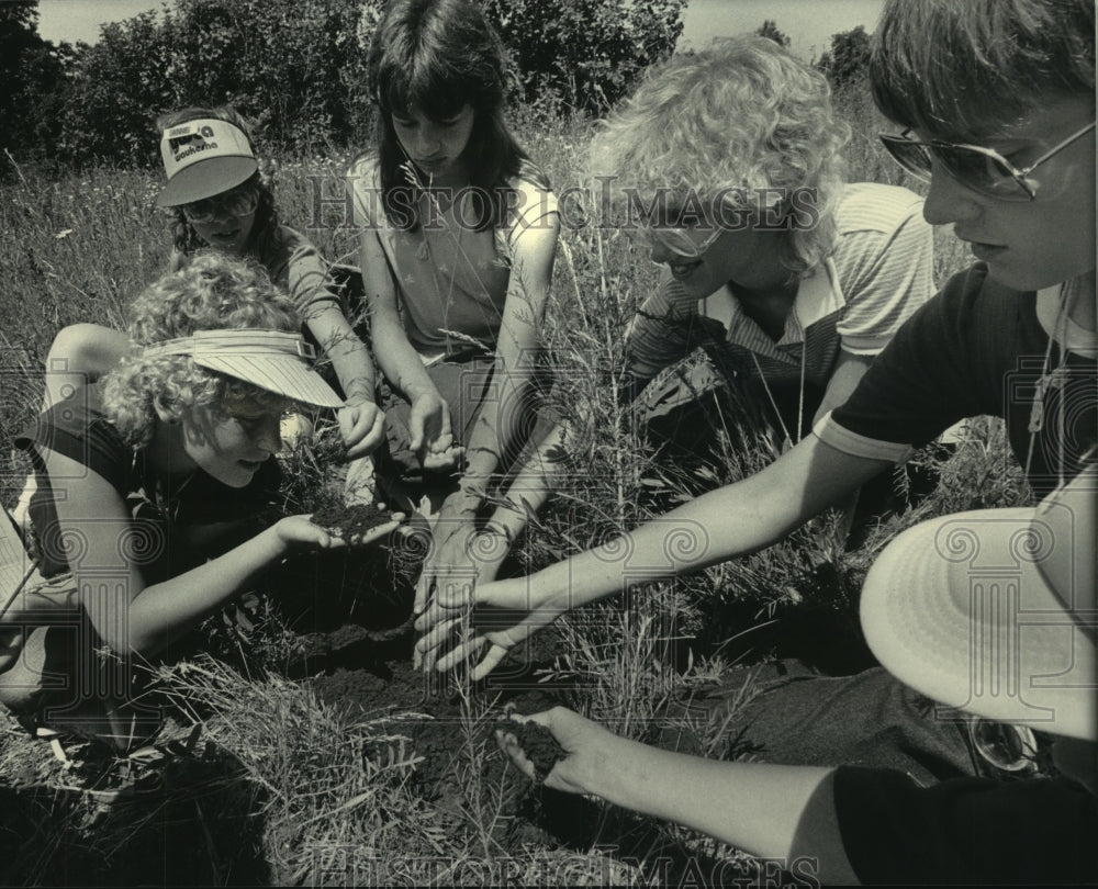 1984, Group takes soil samples at Ottawa Lake Recreational Area, WI - Historic Images