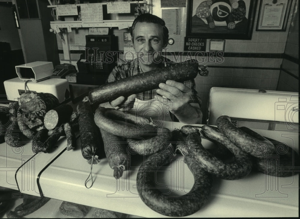 1986, Walter Otto displays products at Otto&#39;s Sausage Shop-Germantown - Historic Images