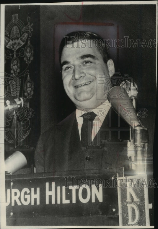 1963, Pierre Salinger smiles from podium - mjc02458 - Historic Images