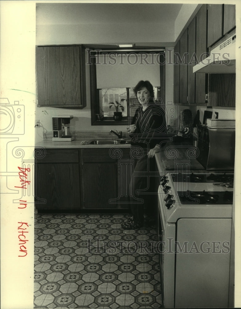 1988, Rebecca Vann is happy with the rehabilitation of her home - Historic Images
