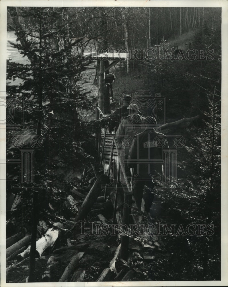 1962, Rifle Deer Hunters Cross Bridge in the Apostle Isalnds - Historic Images