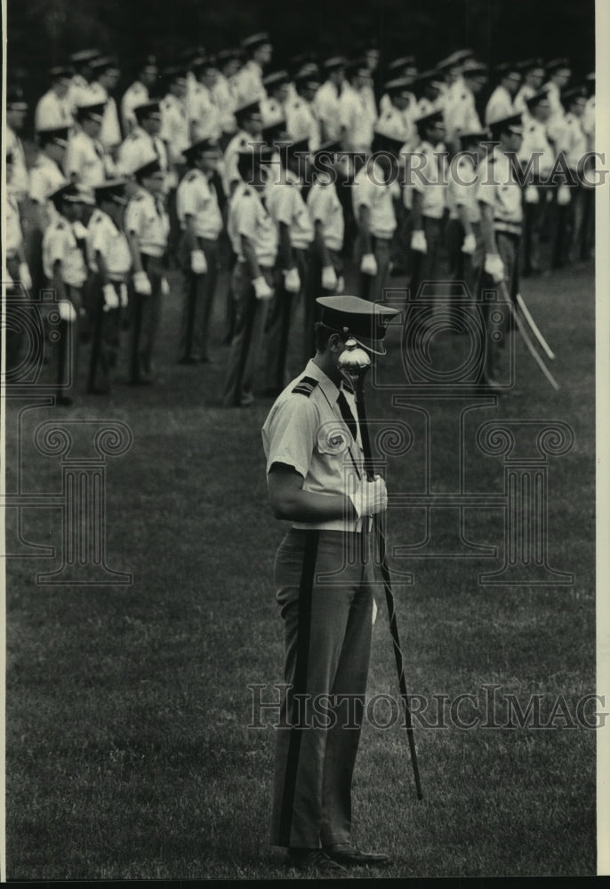 1986, Cadet at St. John&#39;s Military Academy in Delafield bows head - Historic Images