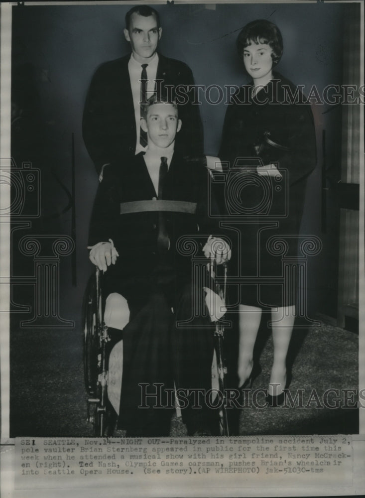 1963 Press Photo Brian Sternberg, friends, strapped in a wheelchair, Washington. - Historic Images