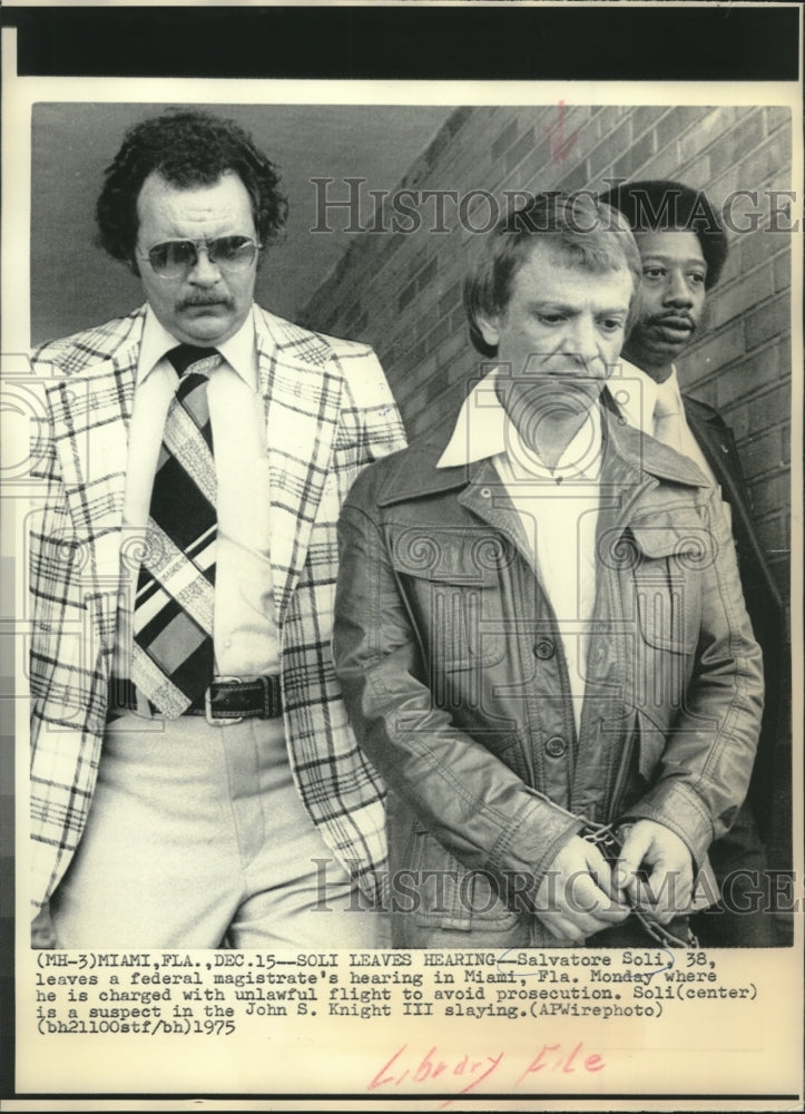 1975, Salvatore Soli leaves federal magistrate's hearing in Miami - Historic Images