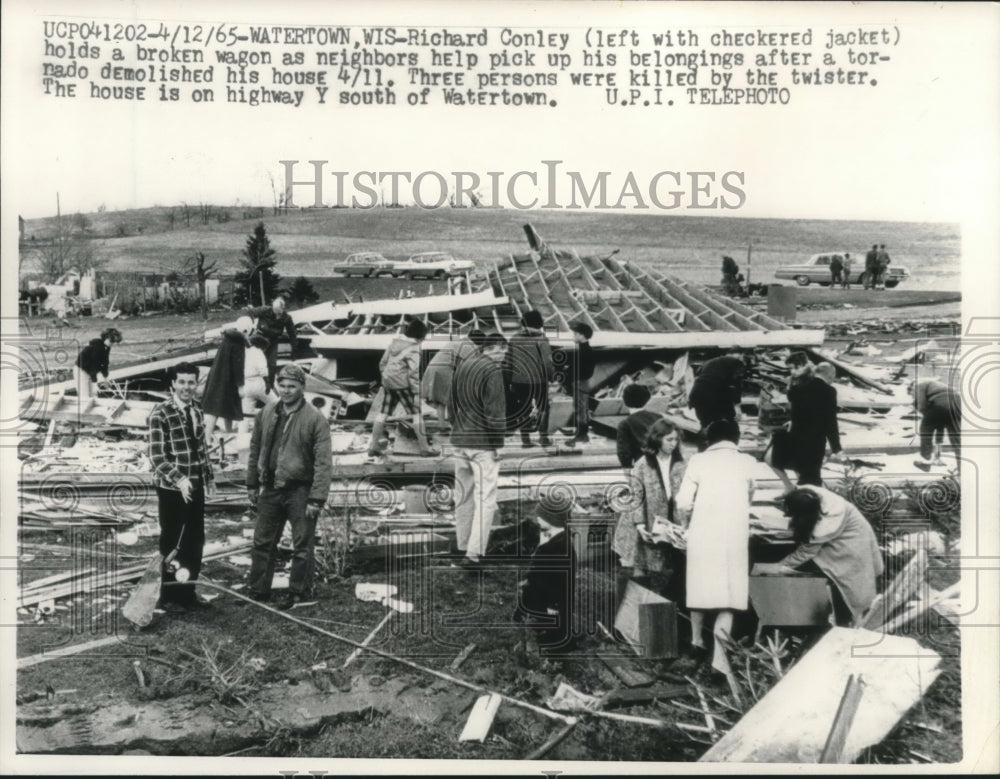 1965 Press Photo Richard Conley Holds Broken Wagon After Tornado Destroyed House - Historic Images