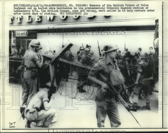 1969, British troops control rioters in Londonderry Northern Ireland - Historic Images