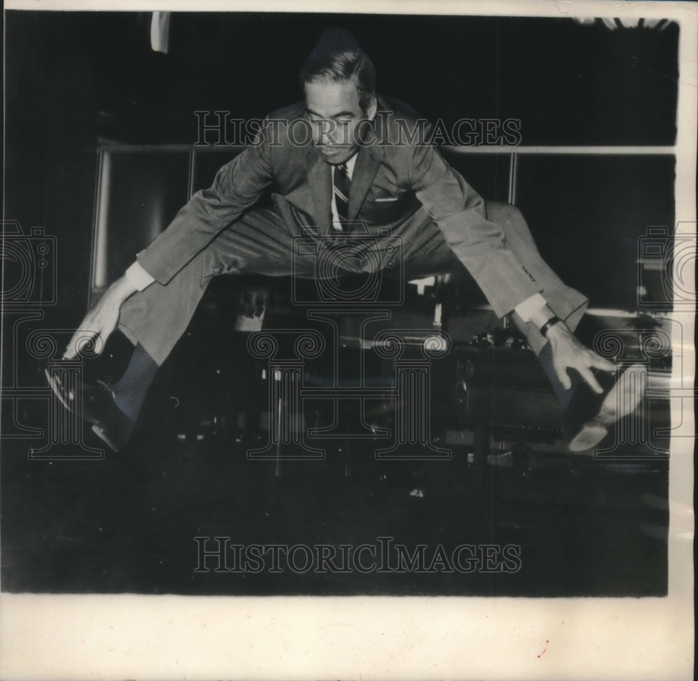 1964 Press Photo Pennsylvania Governor Scranton Mid-Leap In Harrisburg Office-Historic Images