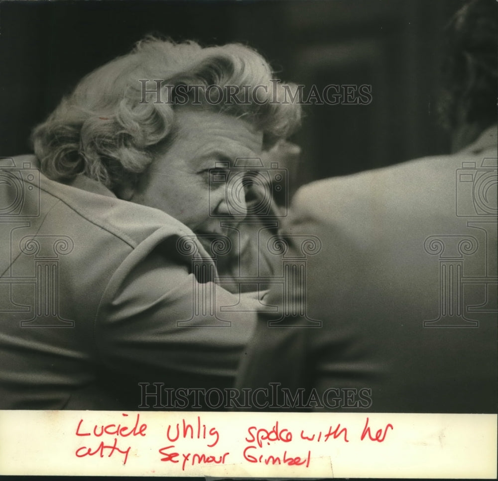 1979, Lucille Uhlig spoke with her attorney Seymour Gimbel in court - Historic Images