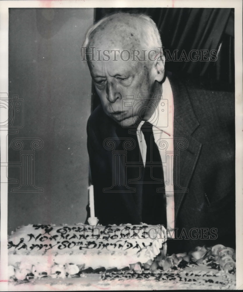 1964 Press Photo Norman Thomas, blowing out his birthday cake candle, New York. - Historic Images