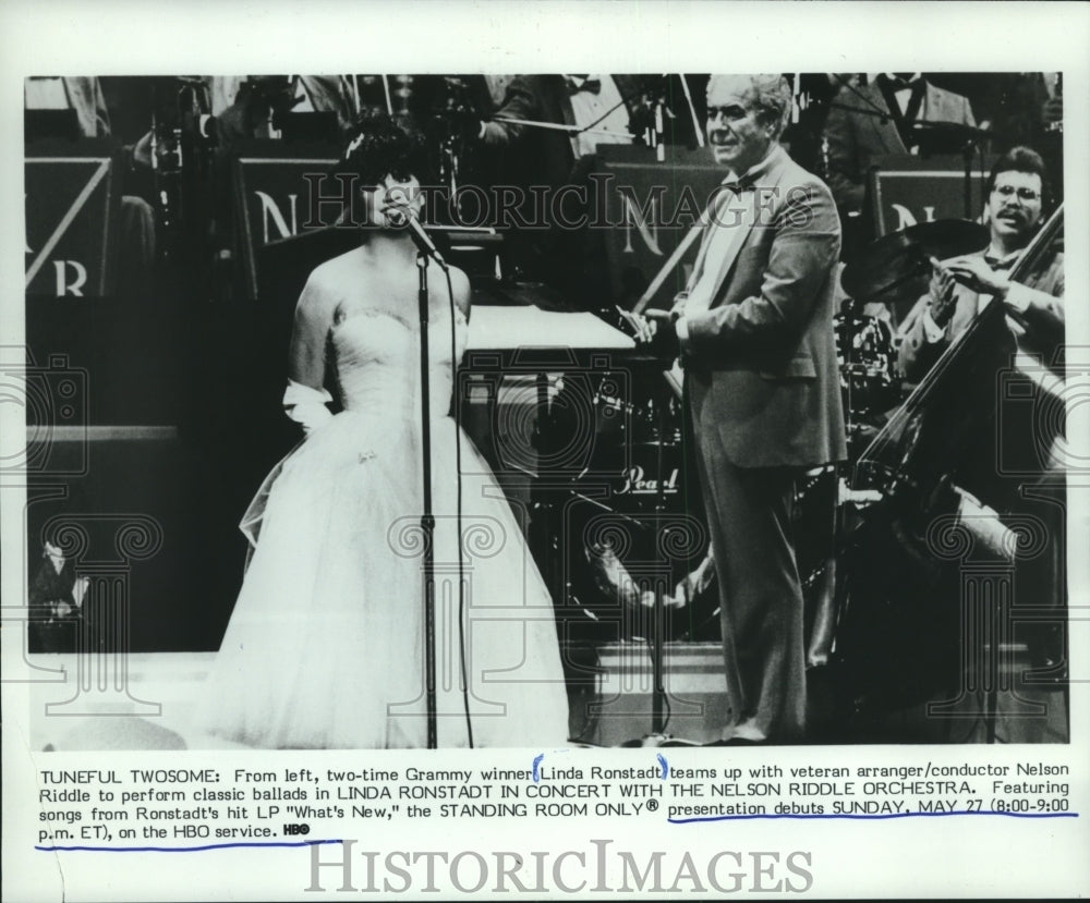 1984 Linda Ronstadt singing, Nelson Riddle conducts orchestra - Historic Images