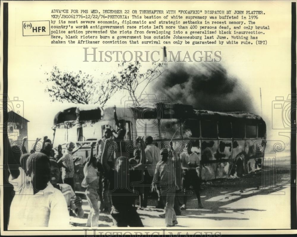 1976, Rioters burn government bus outside Johannesburg, South Africa - Historic Images