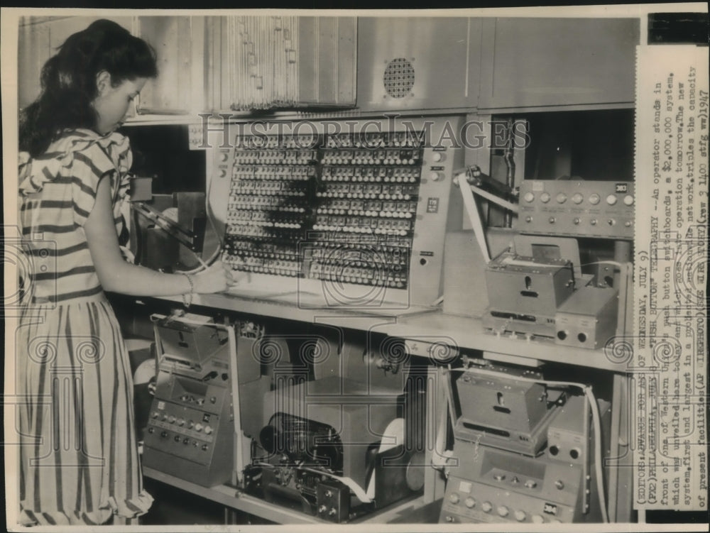 1947 Press Photo Operator in front of Western Union's switchboard, Philadelphia. - Historic Images