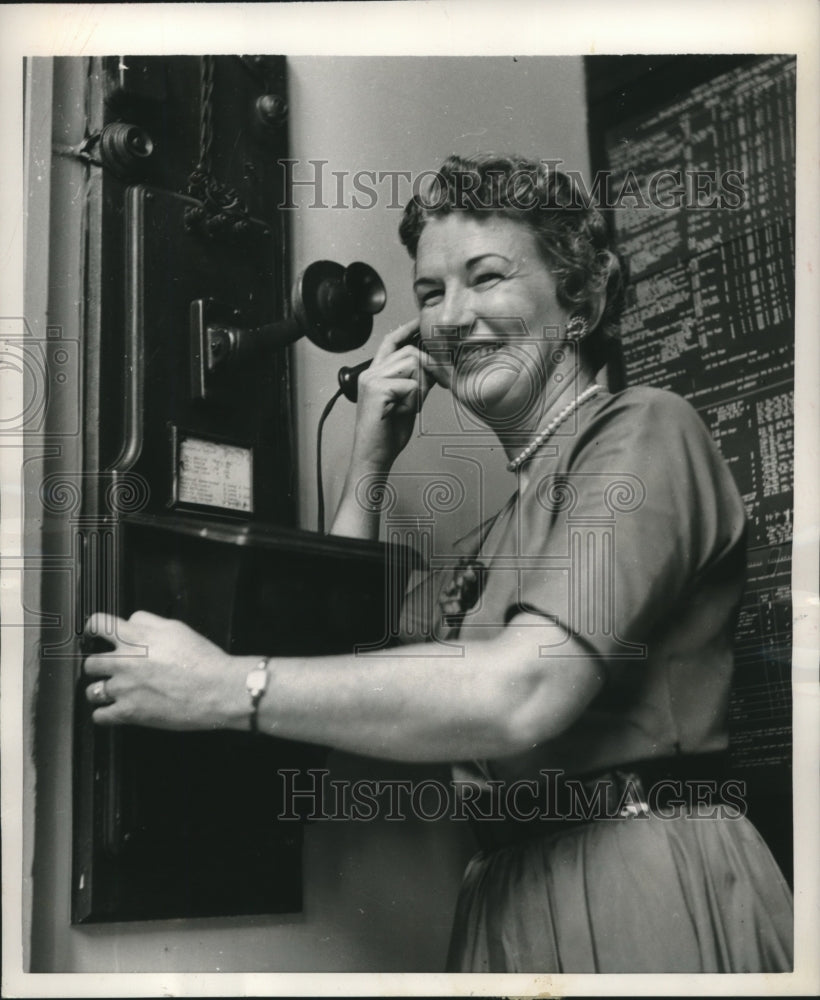 1955 Press Photo Boston City Clerk Mildred Loughran makes call on antique phone - Historic Images