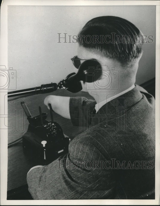 1952 Press Photo World War II veteran uses special telephone he helped develop - Historic Images