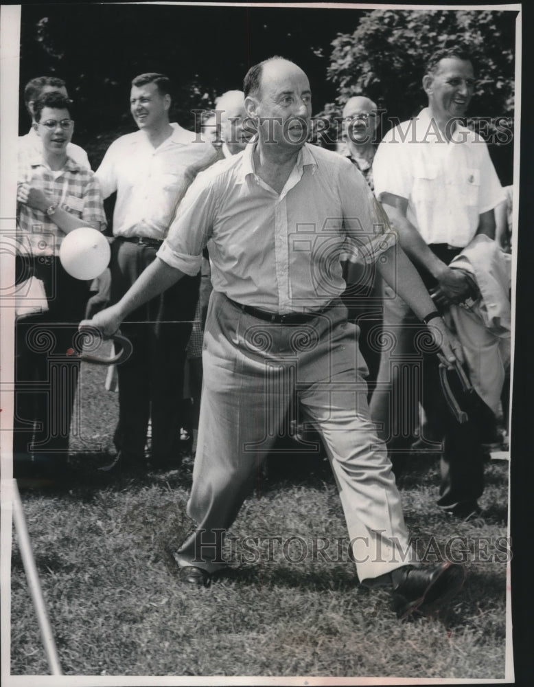1956 Press Photo Adlai Stevenson plays horsehoes with others in Illinois - Historic Images