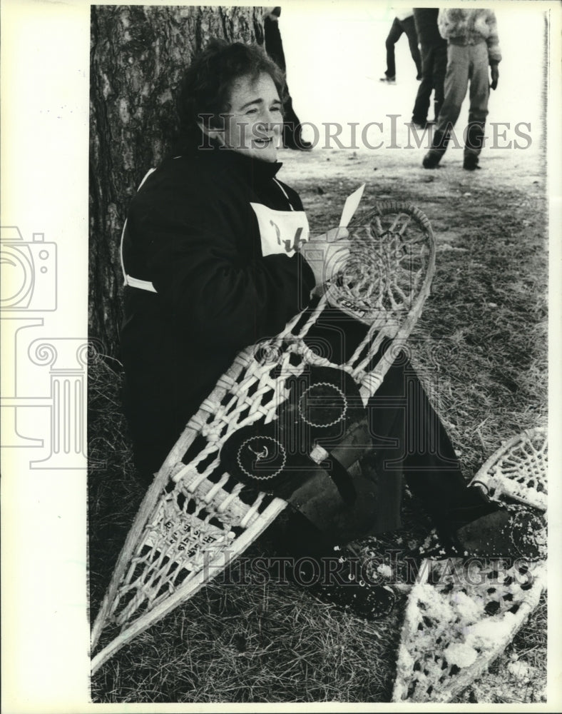 1983 Press Photo Marie Ross resting after World Championship Snowshoe Races- Historic Images