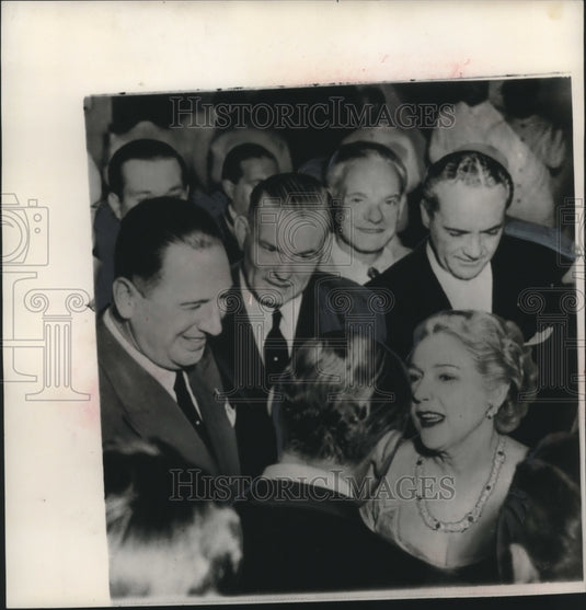 1954 Juan Peron and others greet Buddy Rogers and wife in Argentina - Historic Images