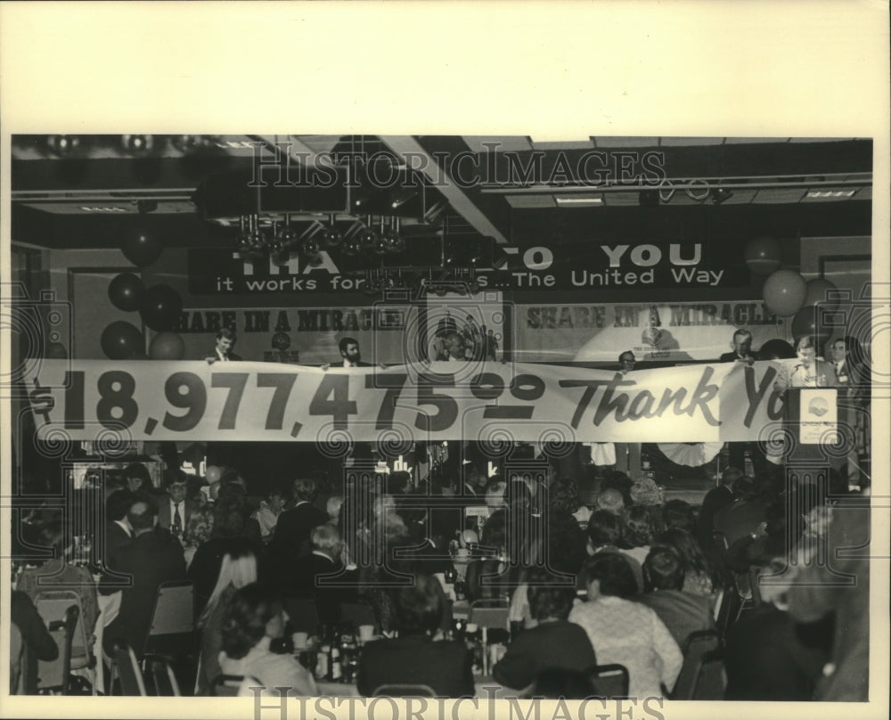 1984, Milwaukee United Way Campaign workers celebrate fundraising - Historic Images