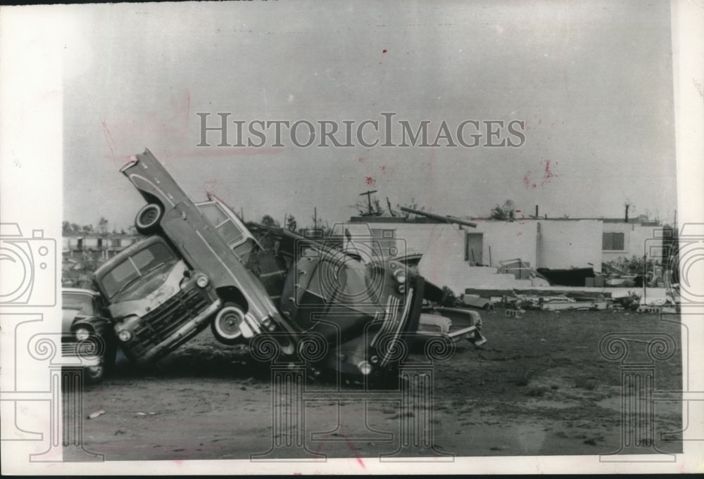 1966 Press Photo Overturned vehicles left from Tampa, Florida tornado - Historic Images