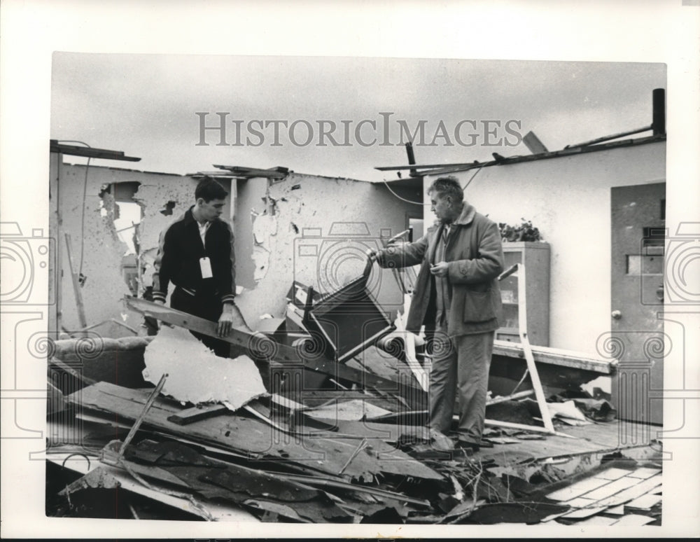 1965 Press Photo Charles Phenegez and son, Charles, Jr., sift through wreckage - Historic Images