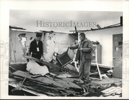 1965 Press Photo Charles Phenegez and son, Charles, Jr., sift through wreckage - Historic Images