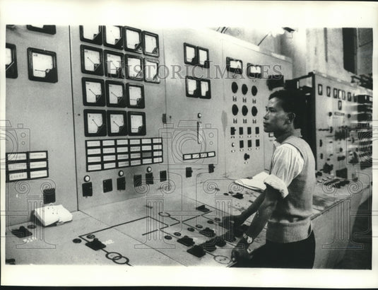 1965, Tibetan technician works in Njajin hydroelectric station, Lhasa - Historic Images