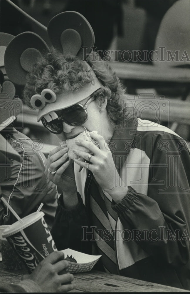 1982, Sue Wesa, of Green Bay, enjoys food at Summerfest - mjc05478 - Historic Images