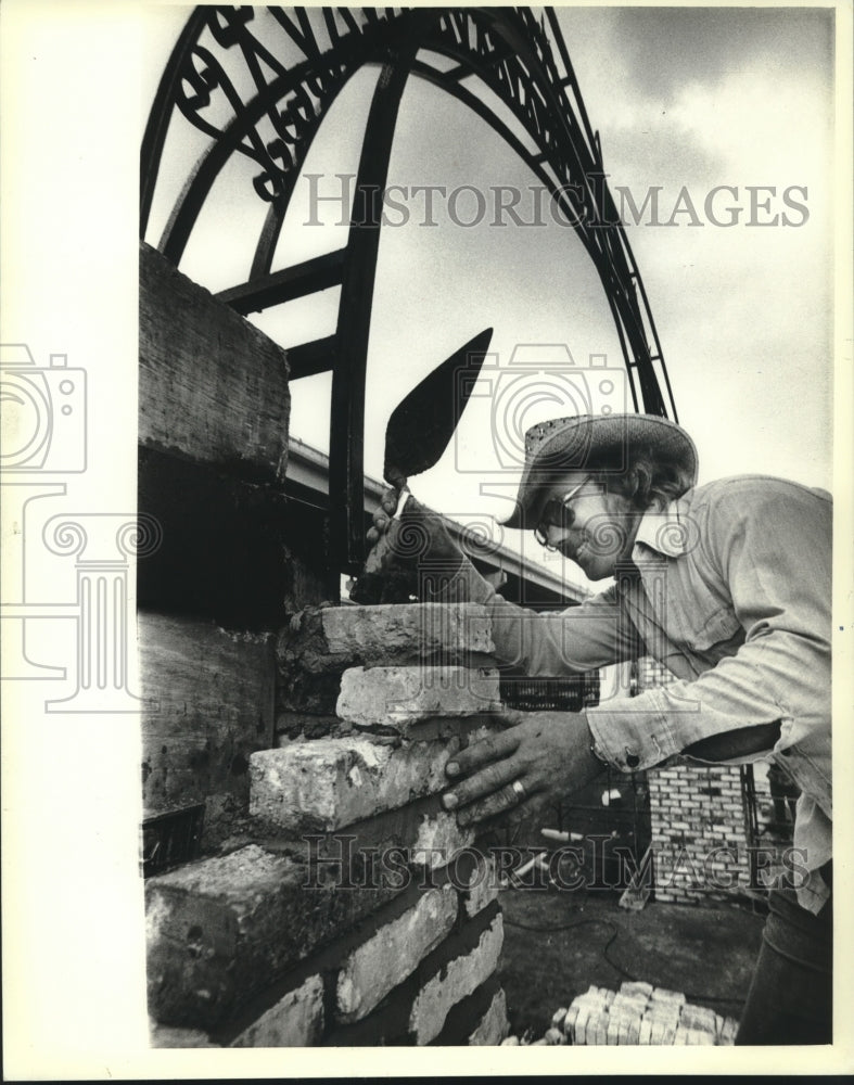 1981, Mark Brunner lays bricks for dance pavilion for Summerfest - Historic Images