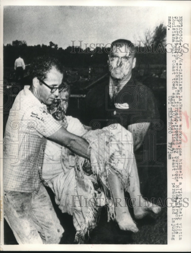 1964, Rescue workers help tornado victims in Galliano, Louisiana - Historic Images