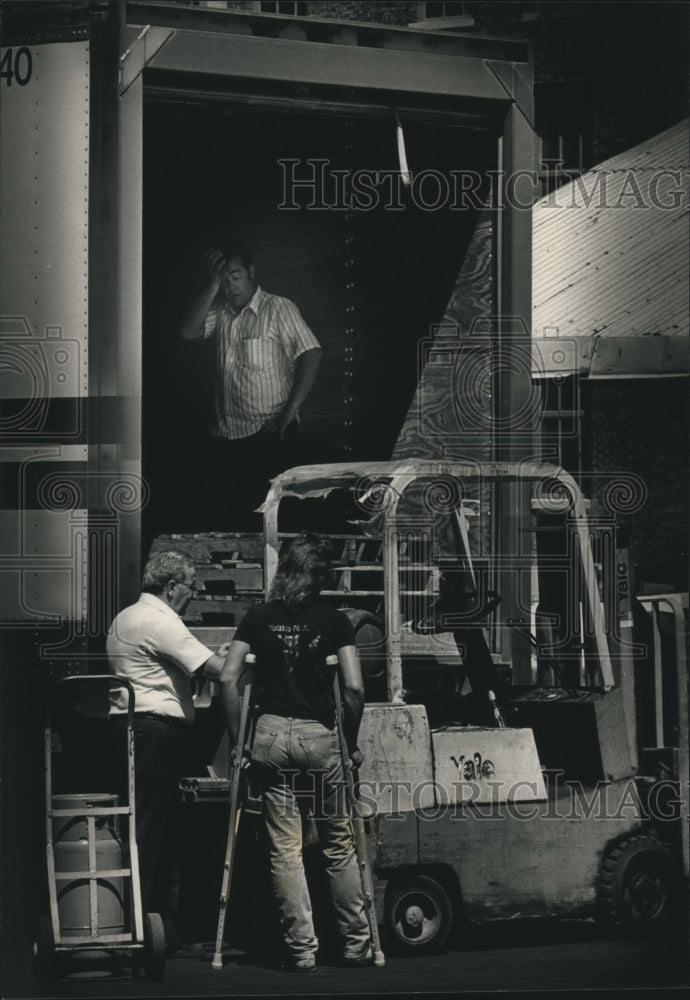 1988 Jon Chickowski of Sheboygan loads a truck in Milwaukee - Historic Images